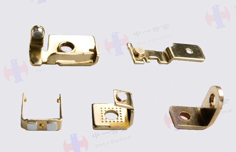 Stamped Integrated Tapping Assemblies for Relays Thermostats